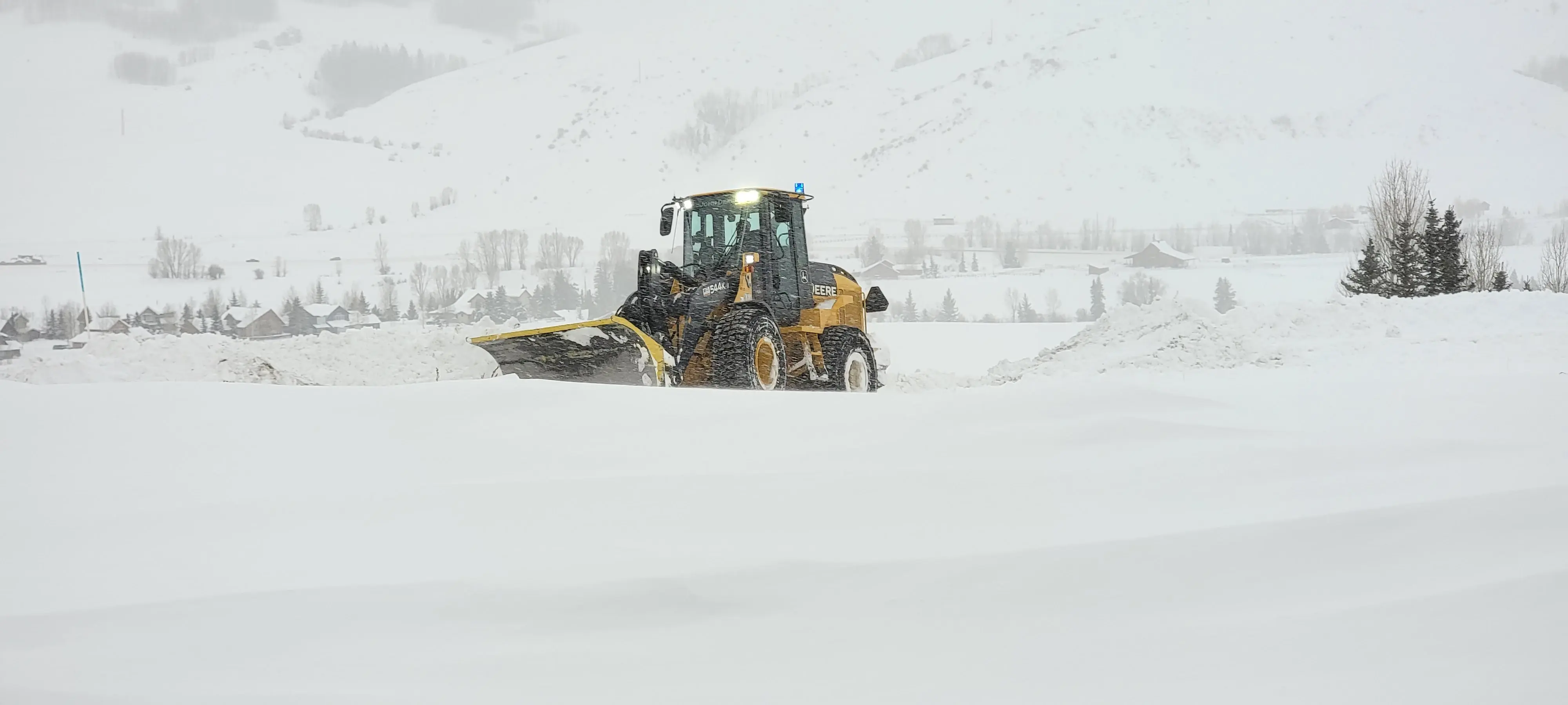 Snowplow at work in winter conditions